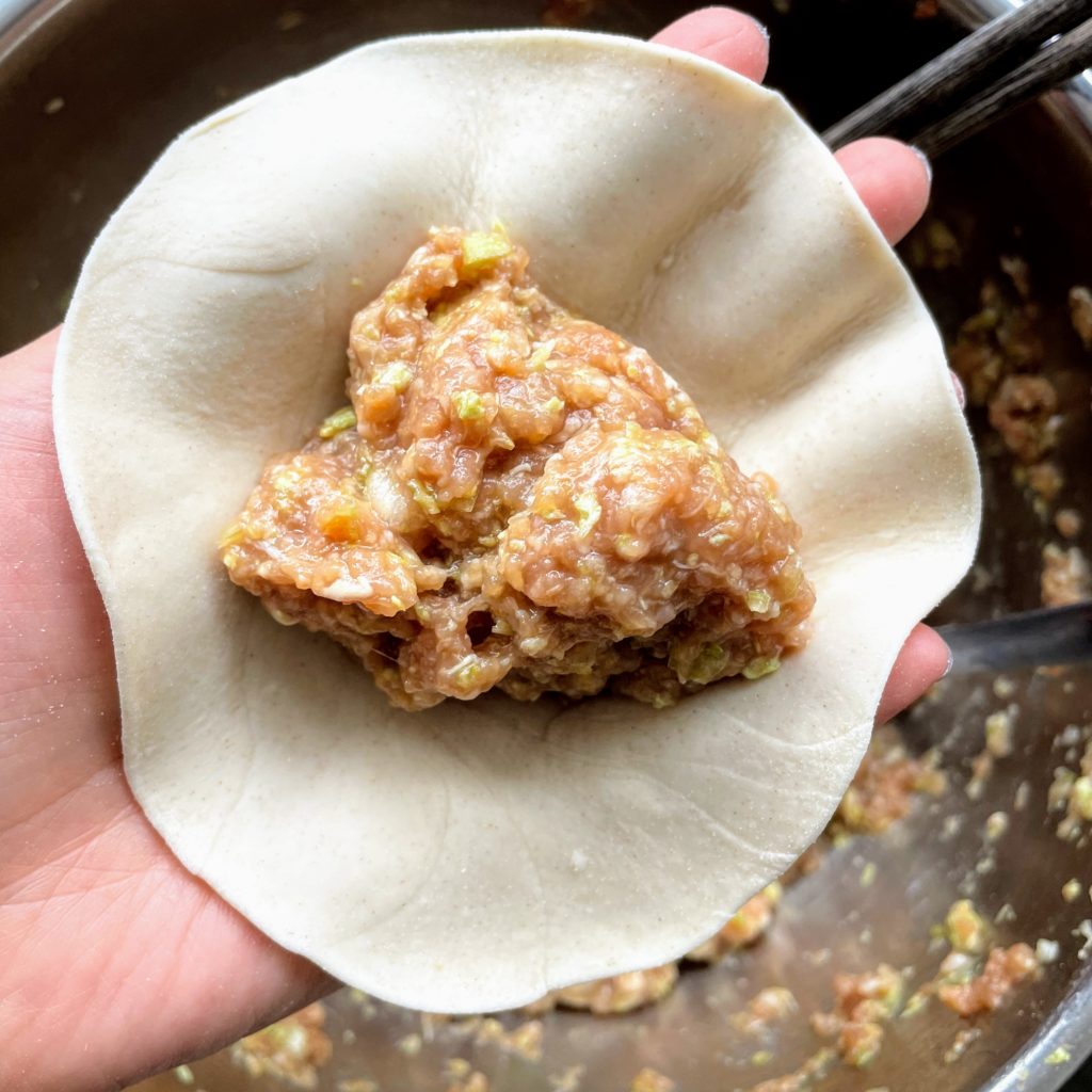 xianbing chinese meat pie adding filling