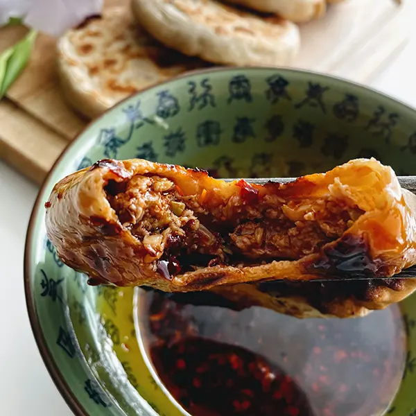 xianbing chinese meat pie eating