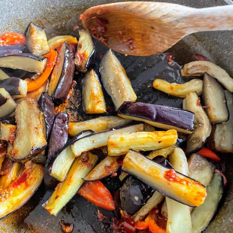 yuxiang aubergine add aubergine to pan