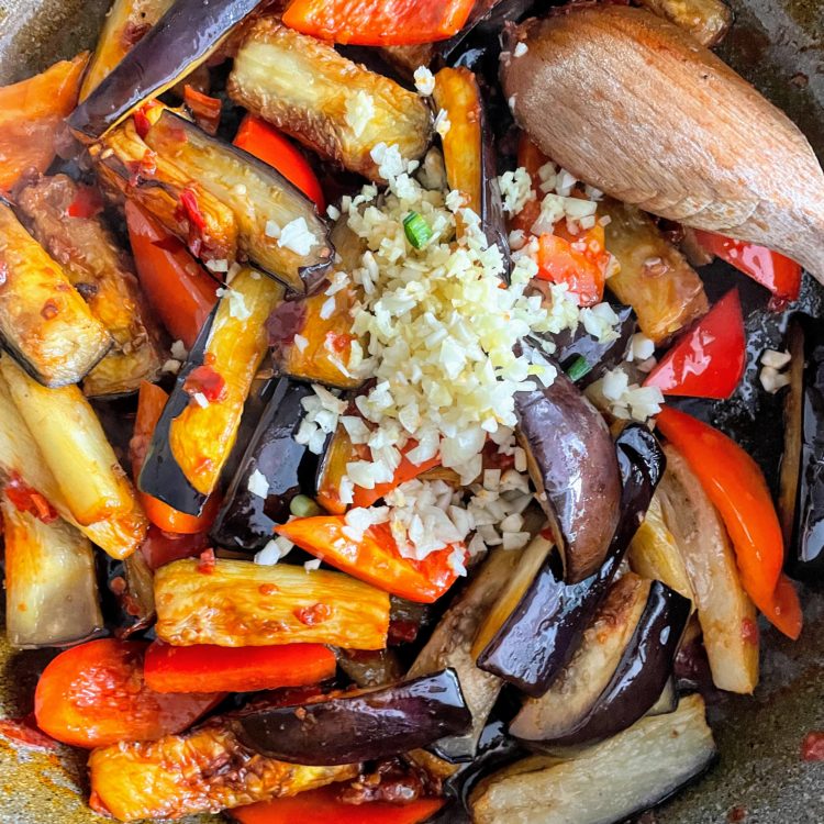 yuxiang aubergine add garlic and ginger to pan