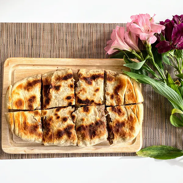 chinese beef and leek pie served