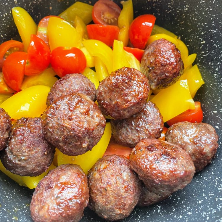 sweet and sour beef meatballs veggies and meatballs together