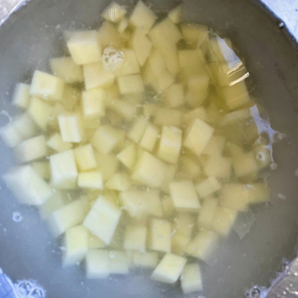 uyghur lamb pilaf soaking potatoes