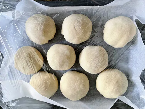 sheng jian bao buns resting