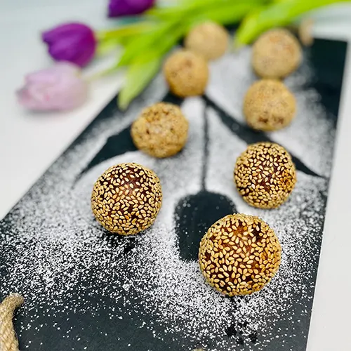 sweet potato sesame balls served