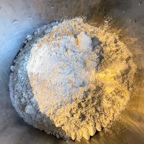 handmade chinese dumpling wrappers flour and salt mixed