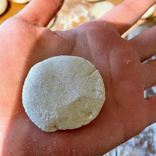 handmade chinese dumpling wrappers dough ball flattened