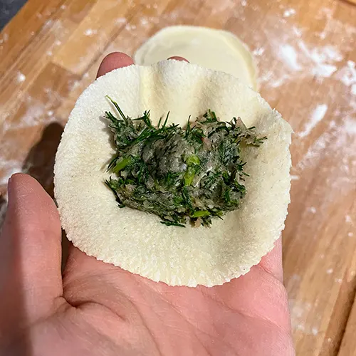 pork and fennel stalks and fronds dumplings stuffing in wrappers