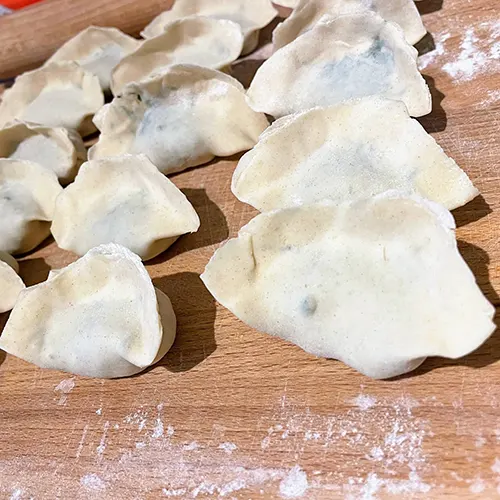 pork and fennel stalks and fronds dumplings dumplings ready to boil