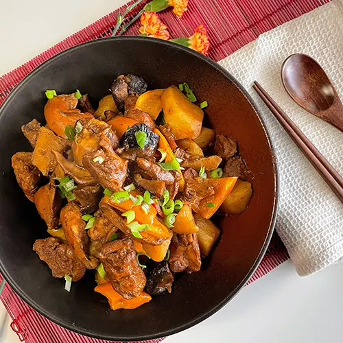 chinese bean paste braised chicken served