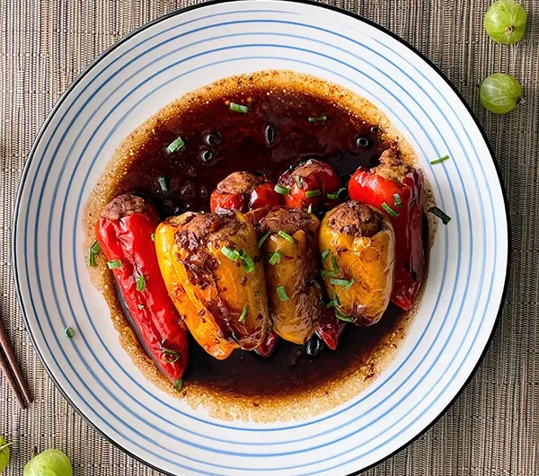 tiger skin pork stuffed peppers served