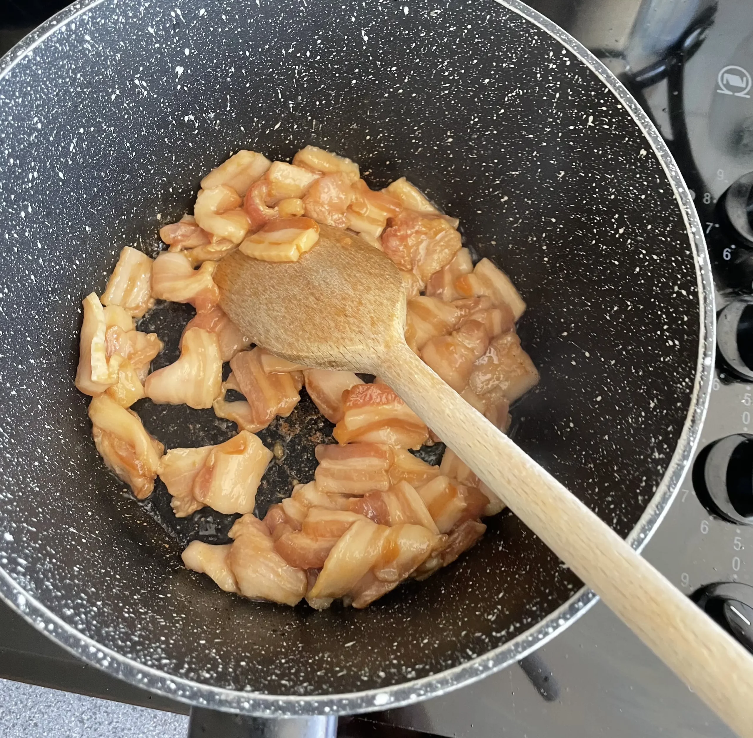 yellow courgette and pork belly stir fry pork in pot