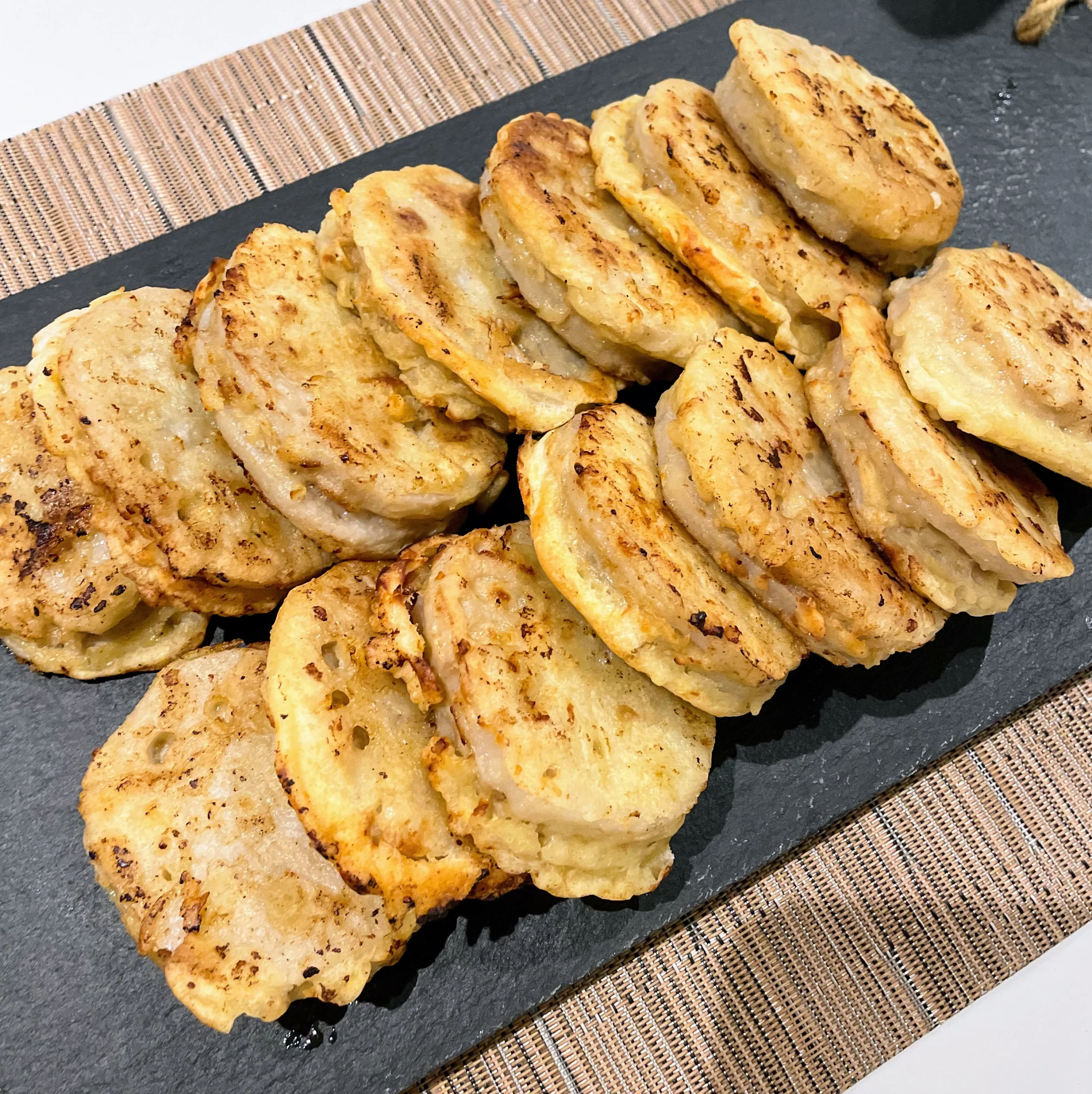 Traditional lotus root and pork patties with dipping sauce