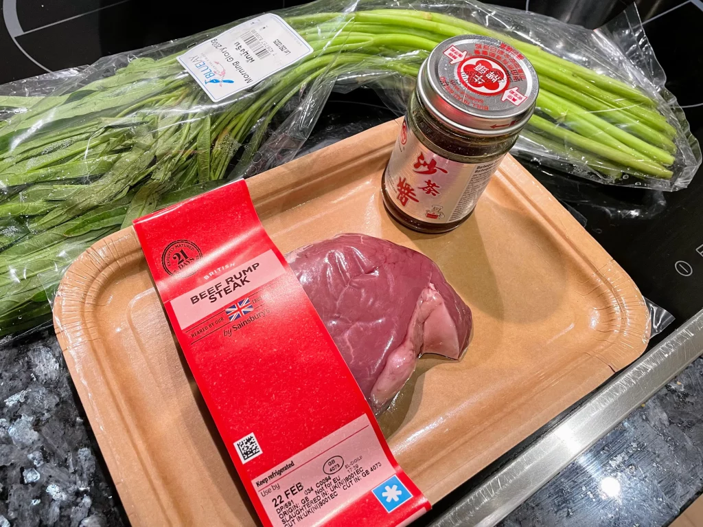 Ingredients for Chinese Shacha beef stir-fry – beef, water spinach, garlic, and seasonings